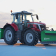 Traktor mit Sami Schneepflug und Streuer